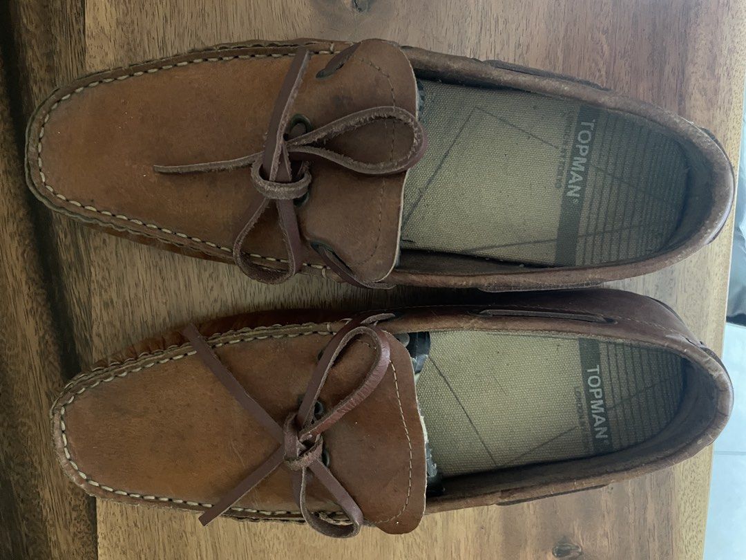 Topman Brown Leather Loafers size 40 (Category: Dress Shoes) located in Quezon City. Submitted by mdsiazon (Listing ID 1424343808, Image 3). Description: - Topman brown leather loafers - Classic loafer design - Stitched upper - Leather laces - Branded insole - Rounded toe - Rubber sole - Well-maintained - Suitable for casual wear.