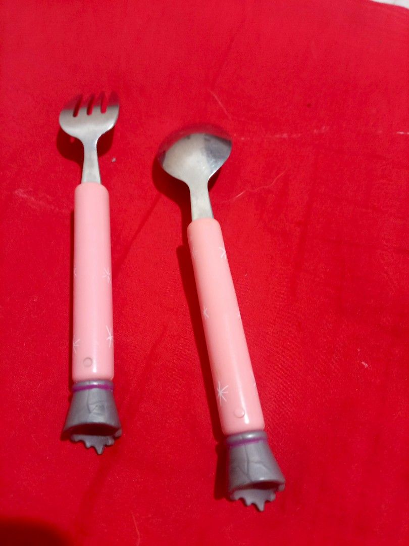 Vintage Barbie Spoon and Fork Set (Category: Dinnerware & Cutlery) located in Marikina City. Submitted by picker_seller17 (Listing ID 1424346094, Image 2). Description: - Barbie spoon and fork set - Pink handles with Barbie logo - Gray handle bottoms - Made of metal - Ideal for Barbie enthusiasts.