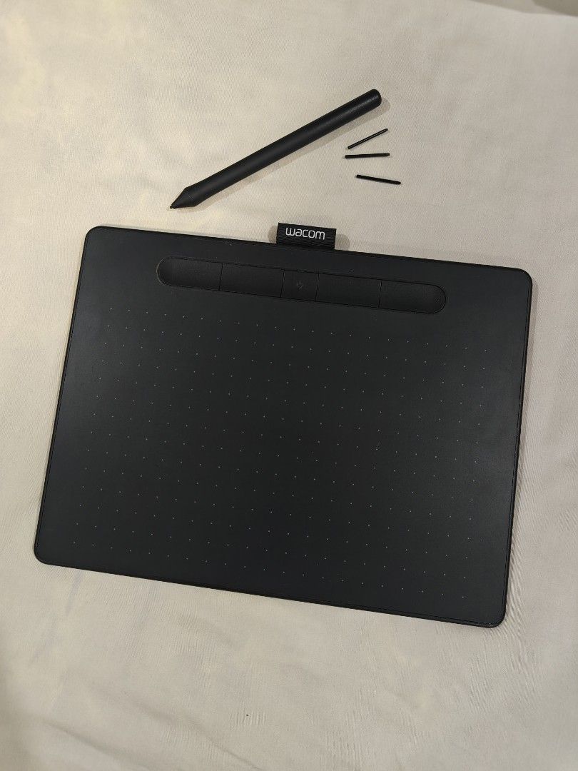 Wacom Intuos Drawing Tablet Medium (Category: Other Gadgets) located in Caloocan City. Submitted by pochbor (Listing ID 1424459464, Image 1). Description: RFS: Bought a Tablet Almost new surface, complete spare nibs unused. Unit only. .