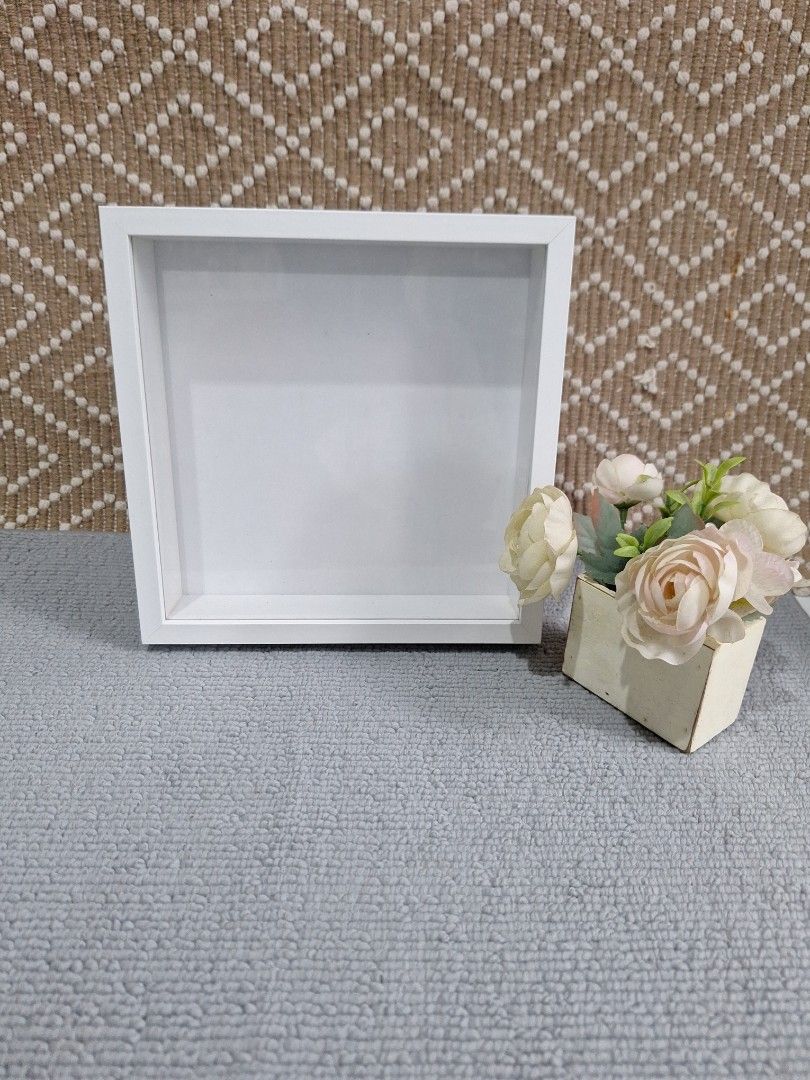 White Box Frame with Stand (Category: Frames & Pictures) located in Naga. Submitted by bellebargainbox (Listing ID 1424365182, Image 1). Description: - Square white shadow box frame - Approximately 1-inch depth - Includes a stand - Ideal for small items or 3D art - Clean and ready for use - used once for an event - 2 for 200.