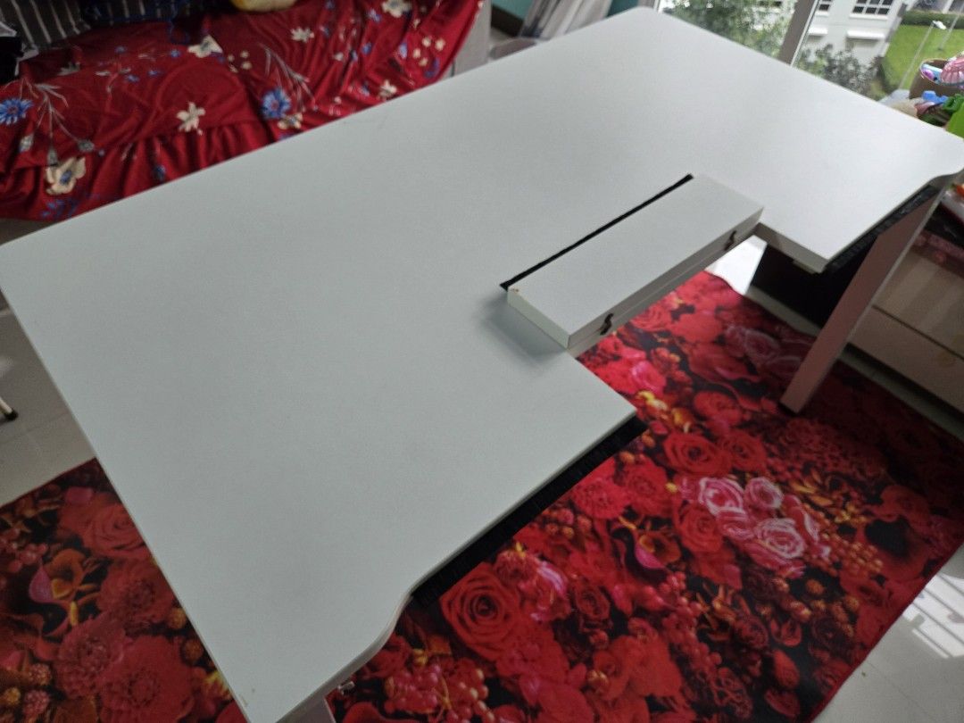 White Study Table (Category: Tables & Sets) located in Singapore. Submitted by ultramanking (Listing ID 1424429103, Image 2). Description: - Spacious white study table - Perfect for work or study - Unique cutout design for convenience - Solid and stable build - Suitable for home or office length : 135cm width : 75cm height : 74cm Delivery not included - Buyer should arrange their own mover + transport. location : Sengkang ** Need to clear by Sund