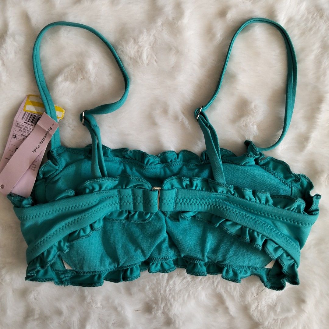 Wild Fable Ruffle Bikini Top XS (Category: Bikinis & Swimsuits) located in Quezon City. Submitted by heybailey (Listing ID 1424435981, Image 2). Description: - Wild Fable bikini top - Vibrant teal color - Ruffle design - Adjustable straps - Clasp closure - Size: XS - Made in Vietnam.