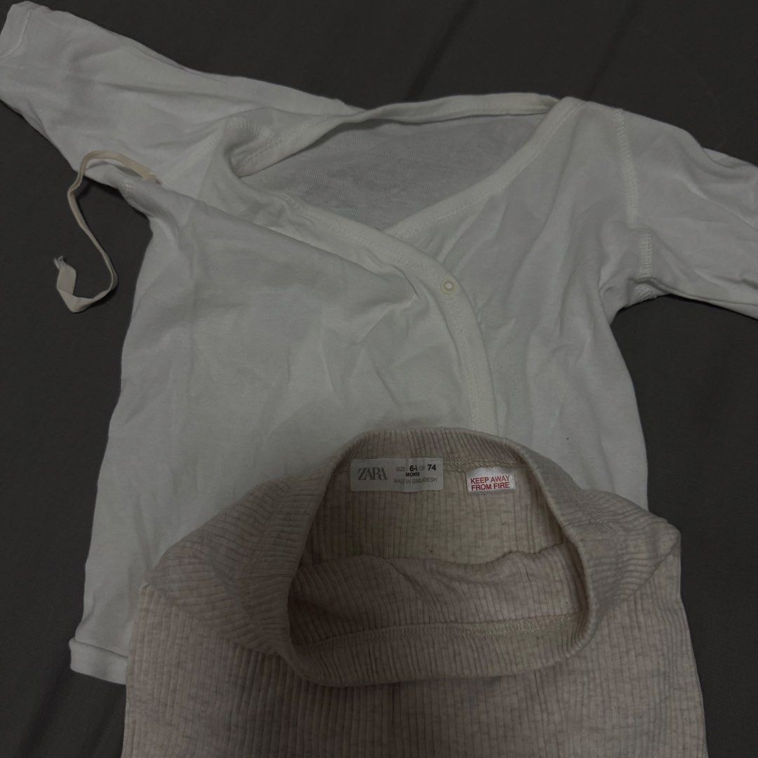 Zara Baby Clothes Set (Category: Babies & Kids Fashion) located in Cavite. Submitted by jomspreloved (Listing ID 1424461404, Image 2). Description: Zara baby clothes set. Includes a white long-sleeved wrap top and beige ribbed pants with feet. Comfortable and stylish for your little one..