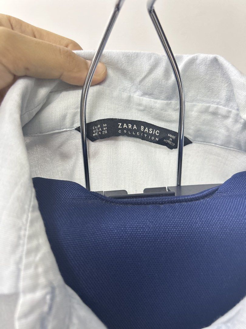 Zara Basic Patch Shirt (Category: Shirts) located in Kuala Lumpur. Submitted by qidddx (Listing ID 1424345613, Image 2). Description: - Zara Basic shirt - Light blue color - Patch details on front and sleeve - Long sleeves - Size M - Made in Morocco.
