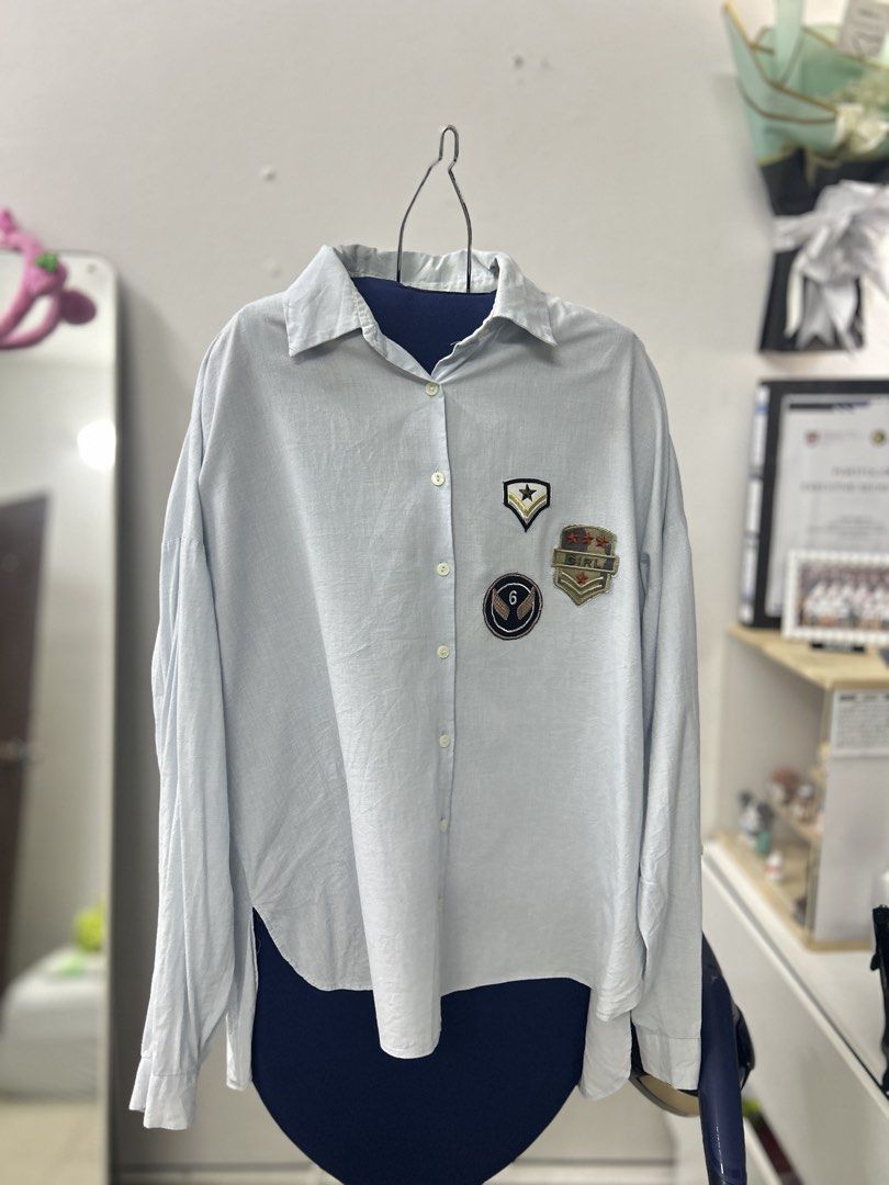 Zara Basic Patch Shirt (Category: Shirts) located in Kuala Lumpur. Submitted by qidddx (Listing ID 1424345613, Image 1). Description: - Zara Basic shirt - Light blue color - Patch details on front and sleeve - Long sleeves - Size M - Made in Morocco.