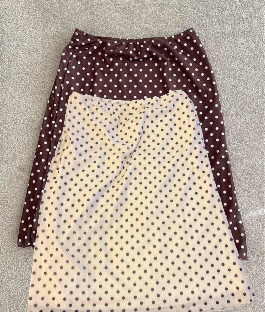 2 Set - White & Brown Polka Dot Midi Skirt (Category: Skirts) located in Quezon City. Submitted by ellathriftss (Listing ID 1429215912, Image 1). Description: Bought both seperately for: P1000 • Same-day Delivery only! Near QC • Willing to negotiate • Color: Cream / Brown • Black polka dots • Elastic waistband • Fits XS-S • No issues RFS: Declutter Location: Quezon City Waist: 24.4-37in, Hips: 33.9in, Length: 22.8in.