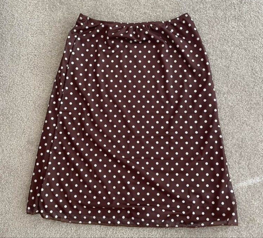 2 Set - White & Brown Polka Dot Midi Skirt (Category: Skirts) located in Quezon City. Submitted by ellathriftss (Listing ID 1429215912, Image 2). Description: Bought both seperately for: P1000 • Same-day Delivery only! Near QC • Willing to negotiate • Color: Cream / Brown • Black polka dots • Elastic waistband • Fits XS-S • No issues RFS: Declutter Location: Quezon City Waist: 24.4-37in, Hips: 33.9in, Length: 22.8in.