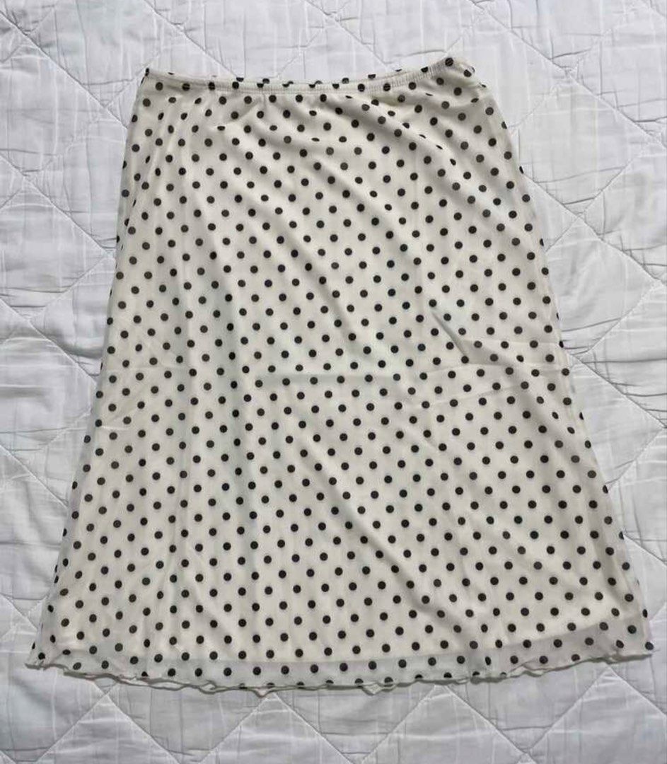 2 Set - White & Brown Polka Dot Midi Skirt (Category: Skirts) located in Quezon City. Submitted by ellathriftss (Listing ID 1429215912, Image 3). Description: Bought both seperately for: P1000 • Same-day Delivery only! Near QC • Willing to negotiate • Color: Cream / Brown • Black polka dots • Elastic waistband • Fits XS-S • No issues RFS: Declutter Location: Quezon City Waist: 24.4-37in, Hips: 33.9in, Length: 22.8in.