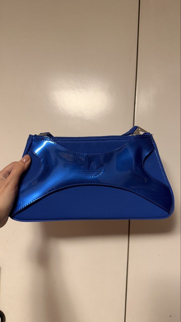 Adidas Clutch Shoulder Bag Blue (Category: Shoulder Bags) located in Makati City. Submitted by mega_manila (Listing ID 1429276899, Image 3). Description: never been used RFS: gift but not my style.