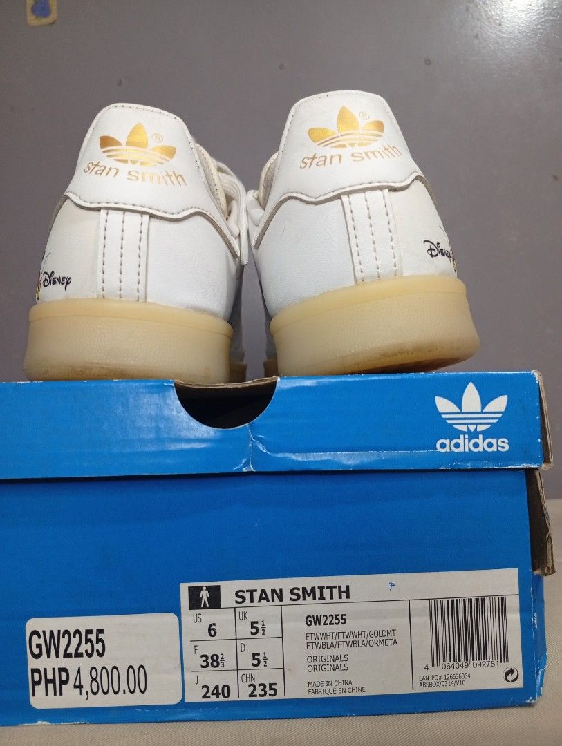 Adidas Stan Smith Disney Mickey Mouse Sneakers (Category: Babies & Kids Fashion) located in Makati City. Submitted by vians2002 (Listing ID 1429169312, Image 2). Description: Adidas Stan Smith sneakers featuring a Disney Mickey Mouse design. The sneakers are white with a tan sole. The size is US 6, UK 5.5, and EUR 38. The box is included. The model number is GW2255. The original price is PHP 4,800.00..