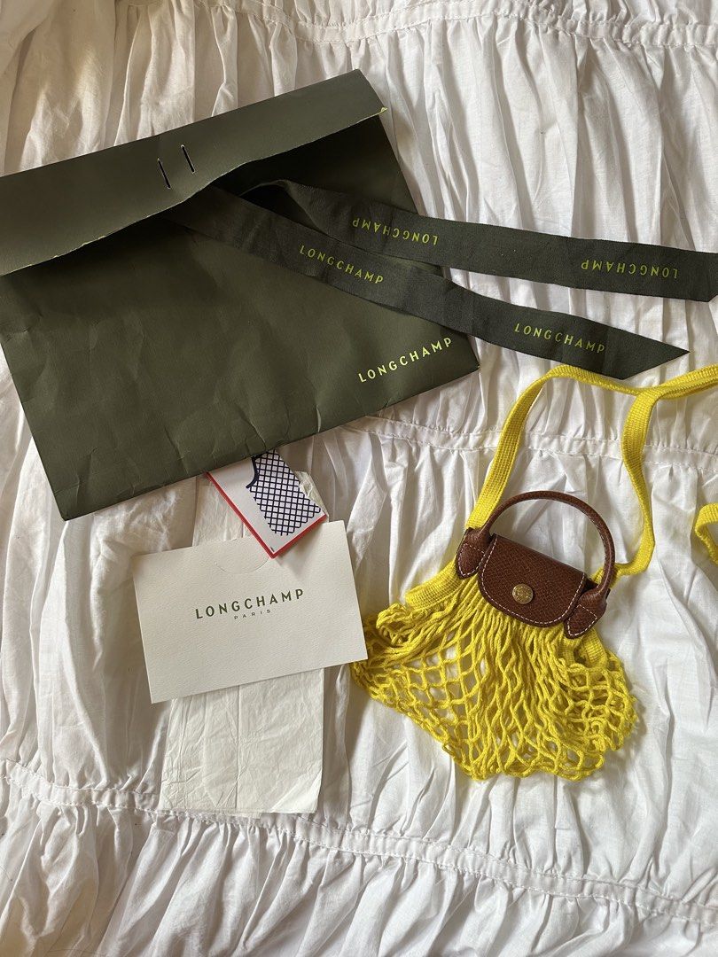 BNWT Longchamp Yellow Le Pliage Filet Mini Bag (Category: Luxury Bags & Wallets) located in Quezon City. Submitted by cstuff_forsale (Listing ID 1429182368, Image 1). Description: 💌 brand new with tag 💌 complete inclusions 💌 authentic from Longchamp 💌 no lowballing! 💌 loc: quezon city / taft 💌 rfs: decluttering.