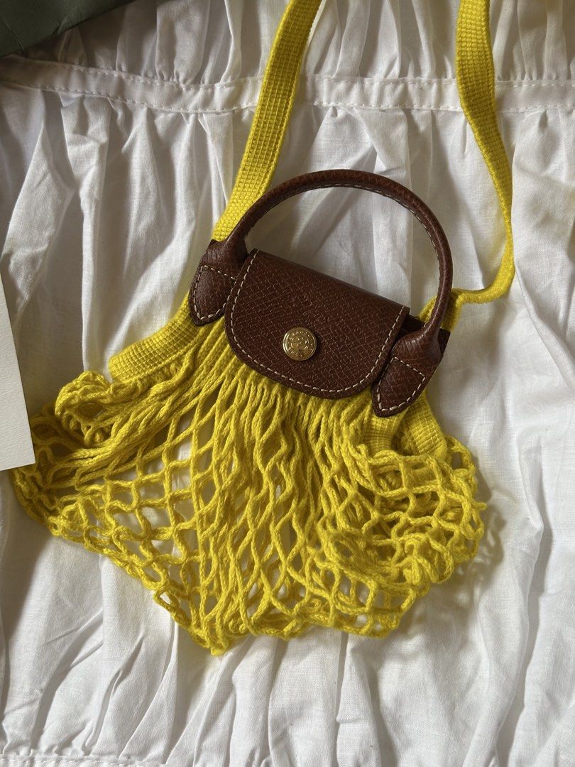 BNWT Longchamp Yellow Le Pliage Filet Mini Bag (Category: Luxury Bags & Wallets) located in Quezon City. Submitted by cstuff_forsale (Listing ID 1429182368, Image 2). Description: 💌 brand new with tag 💌 complete inclusions 💌 authentic from Longchamp 💌 no lowballing! 💌 loc: quezon city / taft 💌 rfs: decluttering.