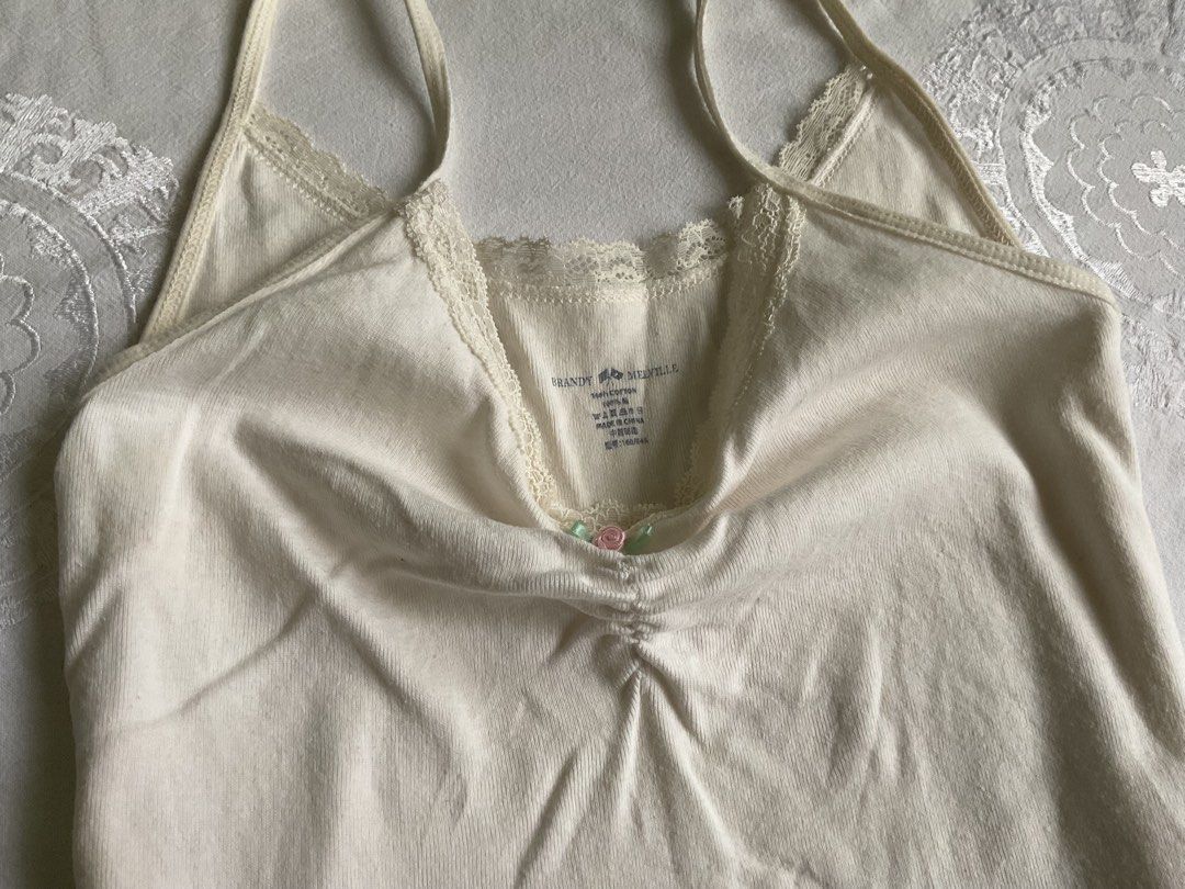 Brandy Melville Cream Tank Top (Category: Sleeveless) located in Rizal. Submitted by komorevie.ph (Listing ID 1429230849, Image 3). Description: stretchy fabric.