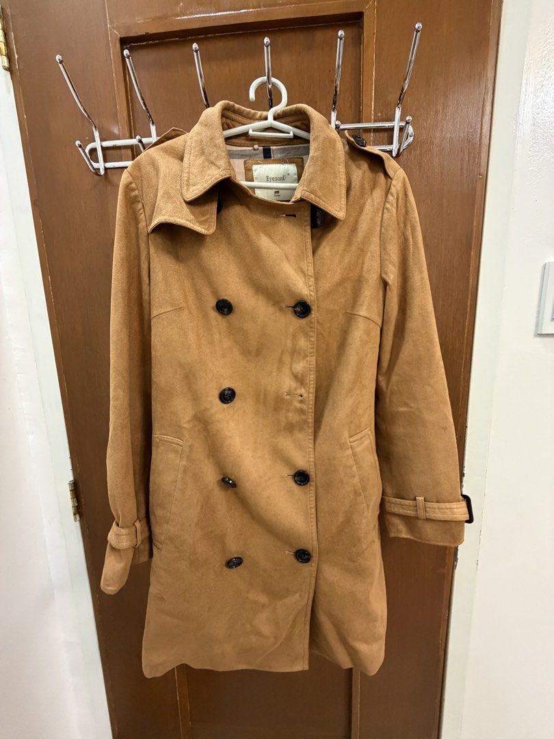 Brown Trench Coat (Category: Coats, Jackets and Outerwear) located in Angeles City. Submitted by exate (Listing ID 1429177134, Image 3). Description: - Stylish brown trench coat - Double-breasted with black buttons - Features a collar and adjustable cuffs - Classic silhouette - Made of a suede-like material - Perfect for adding elegance Size Medium but could fit up to Large .