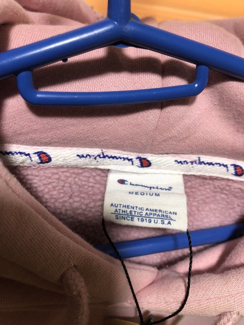 Champion spell out hoodie (Category: Hoodies) located in Cavite. Submitted by dynl_thrift (Listing ID 1429275537, Image 3). Description: Size: Medium - Large Dim: 23/25 Color rate: 9.5/10 issue: Mild discoloration on neck part.