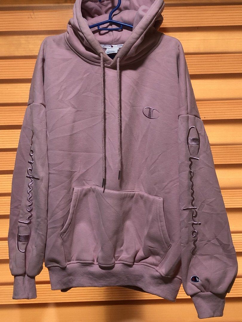 Champion spell out hoodie (Category: Hoodies) located in Cavite. Submitted by dynl_thrift (Listing ID 1429275537, Image 1). Description: Size: Medium - Large Dim: 23/25 Color rate: 9.5/10 issue: Mild discoloration on neck part.