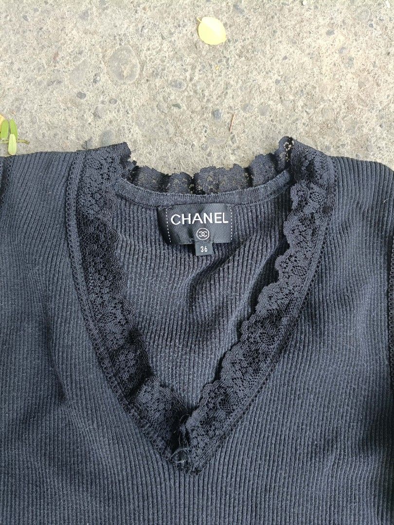 Chanel Black Ribbed Top with Lace Trim (Category: Sleeveless) located in Iloilo. Submitted by singkomils.ilo5000 (Listing ID 1429220542, Image 2). Description: Chanel Size 36 Excellent condition iloilo City 1k.