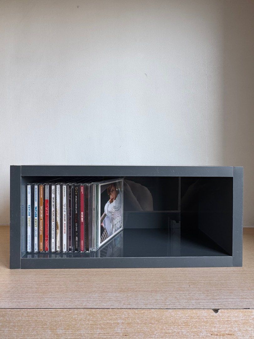 Custom CD Display Shelves (1-Layer and 4-Layer options) - PRE ORDER (Category: Storage Boxes & Baskets) located in Taguig. Submitted by chrisdanguy (Listing ID 1429188091, Image 2). Description: Custom-made wooden CD shelf. Pinagawa ko for my personal collection. Sharing in case other collectors are interested. Measurements are in centimeters (cm). Color: Gray Will proceed with production once enough orders are confirmed 👍 1-Layer : PHP 1800 4-L