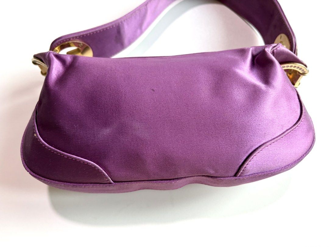 Escada Purple Satin Shoulder Bag (Category: Shoulder Bags) located in Manila. Submitted by declutter_diariess (Listing ID 1429265943, Image 2). Description: Bought for 7k Havent tried cleaning it yet You can have it taken to the bag spa and have the diamonds readded Very beautiful bag especially when worn on shoulder.