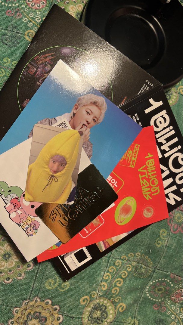 EXO-SC 1 Billion Views Album (Category: K-Wave Merchandise) located in Pasay City. Submitted by nikki_ang (Listing ID 1429226173, Image 2). Description: Listing includes the EXO-SC 1 Billion Views album. It comes with a Chanyeol photo card, a banana Chanyeol photo card, and other inclusions. The album features a rocket design on the back..