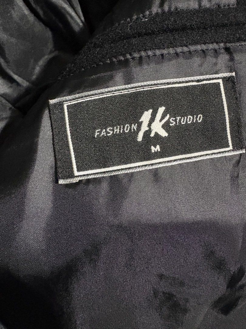 Fashion 1k Studio Black Coat Wool (Category: Coats, Jackets and Outerwear) located in Manila. Submitted by journeypreloved (Listing ID 1429173628, Image 2). Description: Negotiable!!! Black coat from Fashion 1k Studio. It has a classic design with a button closure and a lapel collar. The coat is made of 80% wool and 20% polyester. It has a size M. The coat has a sleek, dark appearance, suitable for various occasions. Super cute!!!.