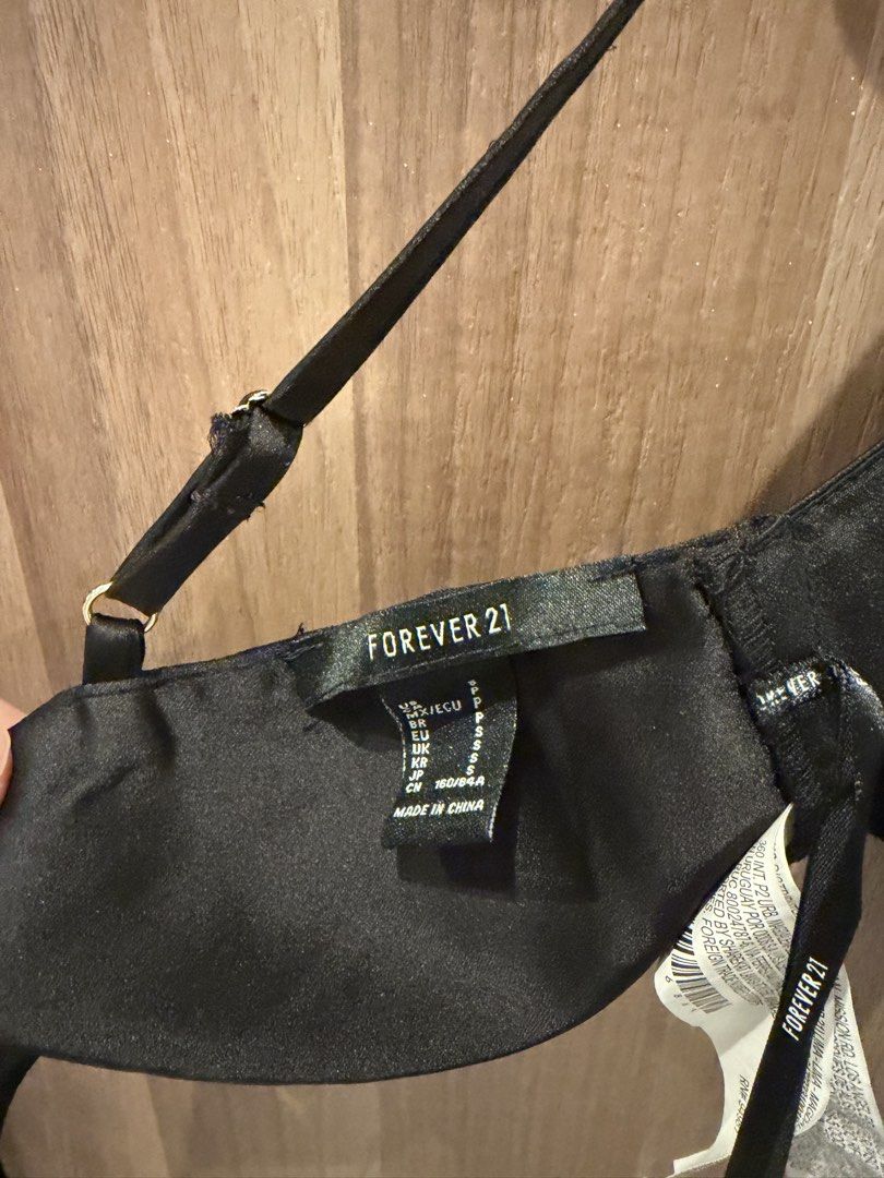 Forever 21 Black Silk Cropped Tie Top (Category: Sleeveless) located in Quezon City. Submitted by loveniccc (Listing ID 1429292890, Image 3). Description: .