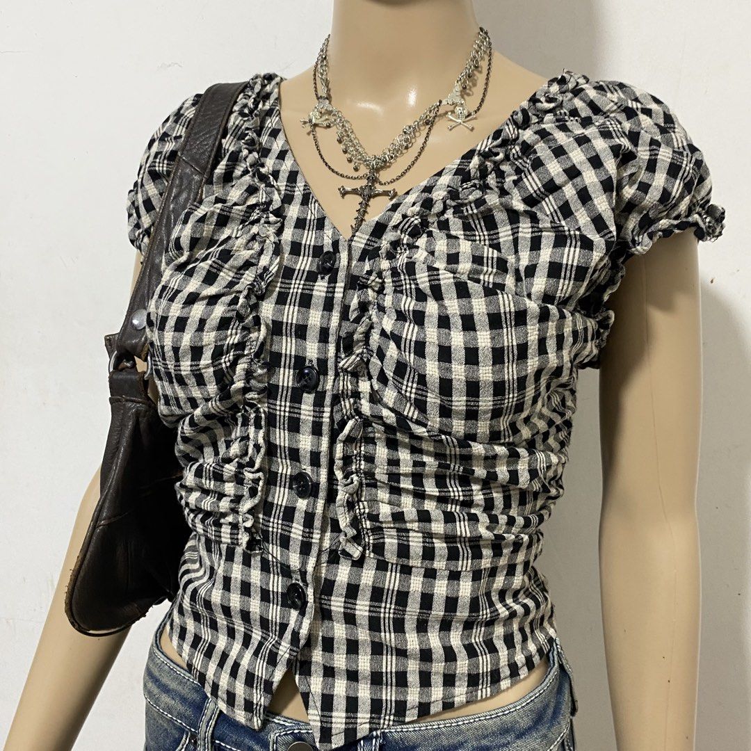 Gingham Ruffle Milkmaid Buttoned Top Y2k (Category: Blouses) located in Balanga. Submitted by cherryblunt (Listing ID 1429316806, Image 2). Description: ⬇️ S-M -garterized measurements (laid flat) pit to pit- 18” length- 20” MOP- GCASH/BANK TRANSFER MOD- J&T EXPRESS ONLY.