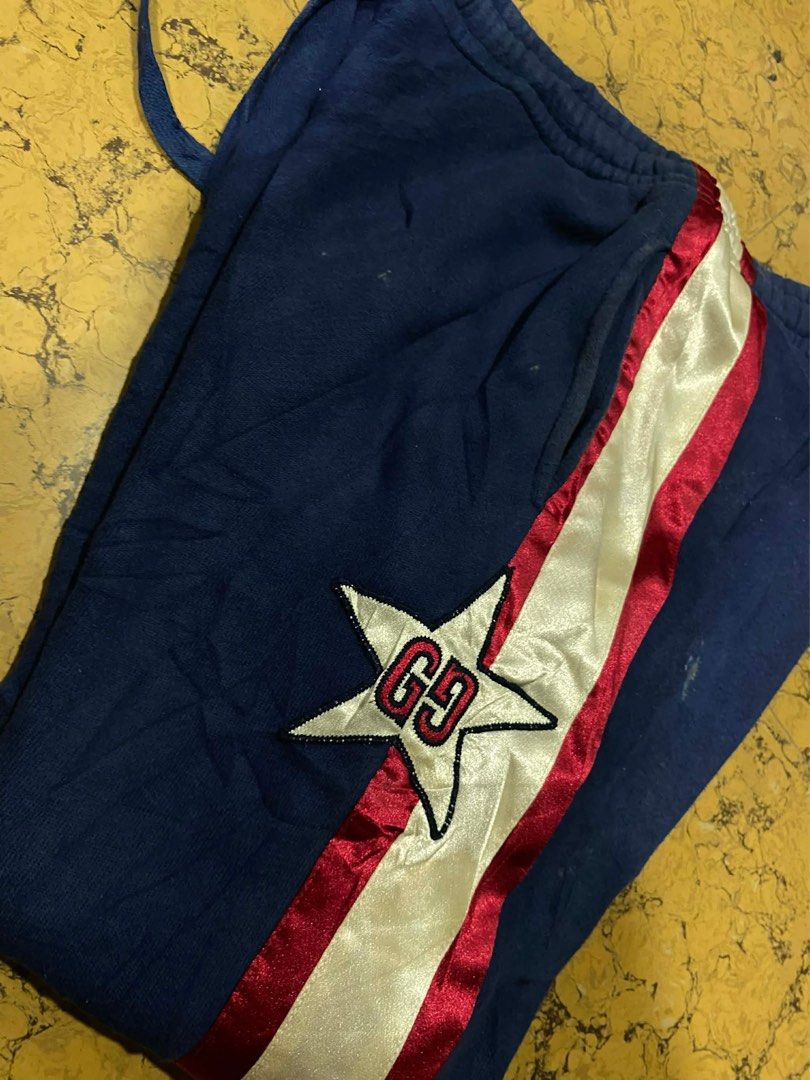 Gucci (Category: Joggers) located in San Fernando. Submitted by jyyyshytt (Listing ID 1429305706, Image 3). Description: - Authentic Gucci joggers - Navy blue color - Red and white stripe detail - Features Gucci logo - Made in Italy - Size M.