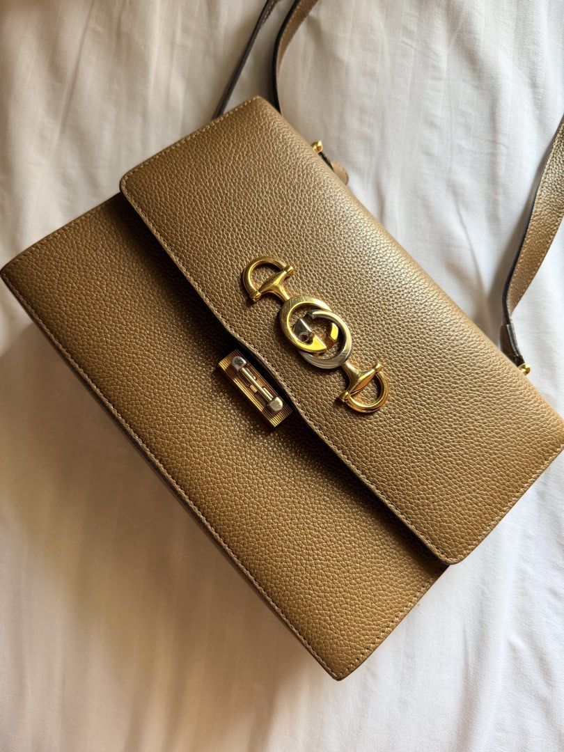 Gucci Zumi (Category: Luxury Bags & Wallets) located in Makati City. Submitted by arjayv (Listing ID 1429190585, Image 1). Description: Authentic Gucci Zumi Bag. Still in good condition. Pickup at Acacia Estates Php 60,000.