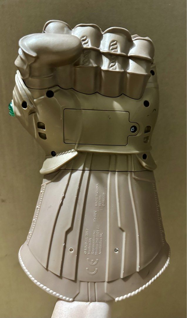 Thanos Infinity Gauntlet (Category: Figurines & Statues) located in Binan City. Submitted by elf.0000 (Listing ID 1429288870, Image 2). Description: Hasbro Marvel Avengers Infinity Gauntlet. It features the iconic design with the Infinity Stones. The gauntlet is made in China and has the Marvel 2017 copyright. Battery operated, working condition P900.00 plus sf Woth some discoloration or scratches Payment via gcash Ship thru j&t.