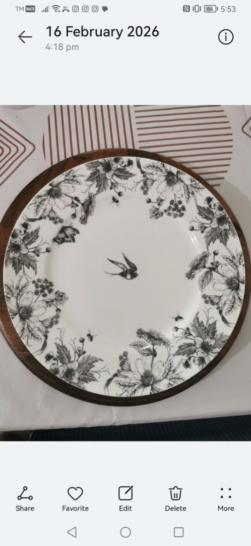 Dinner Plates H&M Home Decorative Plate 12 pcs (Category: Dinnerware & Cutlery) located in Las Pinas. Submitted by budget_buys29 (Listing ID 1429190914, Image 2). Description: Decorative plate from H&M Home features a black and white floral design with a bird in the center. It is made in Bangladesh. The plate has a white background with a black floral border. The back of the plate has the H&M Home logo and care instructions..