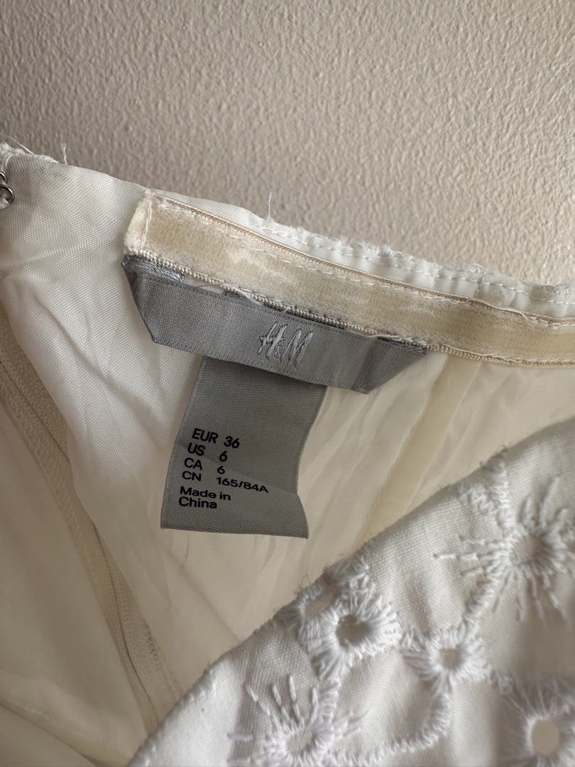 H&M White Eyelet Dress (Category: Dresses) located in Quezon City. Submitted by loveworn (Listing ID 1429230690, Image 3). Description: Good condition. RFS: major decluttering of clothes I haven’t worn in forever :).
