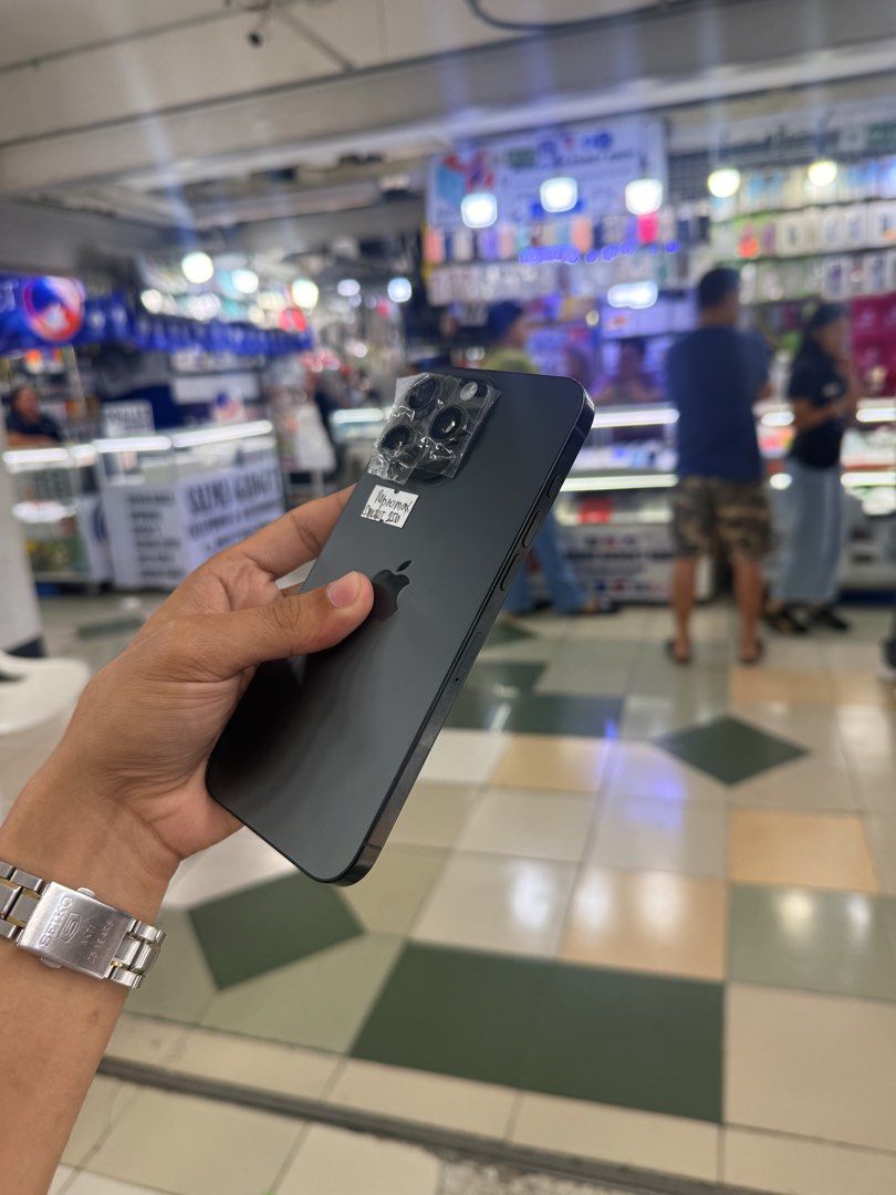 iPhone 16 Pro Max Smart 256gb 100% batt 5 Cycle Count NTC (Category: iPhone 16 Series) located in Manila. Submitted by carimgadgets (Listing ID 1429199729, Image 3). Description: NOTE: Tape on camera is for protection from scratches, overall it's makinis and smooth - iPhone 16 Pro Max - Smart Lock - Black Titanium Color - 256GB Storage - 100% Battery Health - 5 Cycle Count - NTC Approved - Available for Delivery - Meetup at V-Mall (Greenhills).