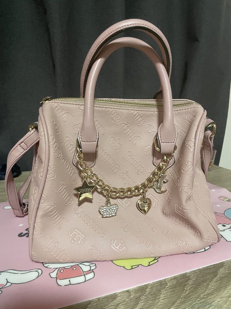 Juicy Couture Pink Satchel Bag (Category: Cross-body Bags) located in Quezon City. Submitted by lukajaeger (Listing ID 1429288442, Image 2). Description: Original Juicy Couture Eastside Westside Satchel -2 pockets on the inside (see picture for reference) -lightly used -has an adjustable strap, smallest possible length is roughly around 20 inches -bought from the us -tag included.