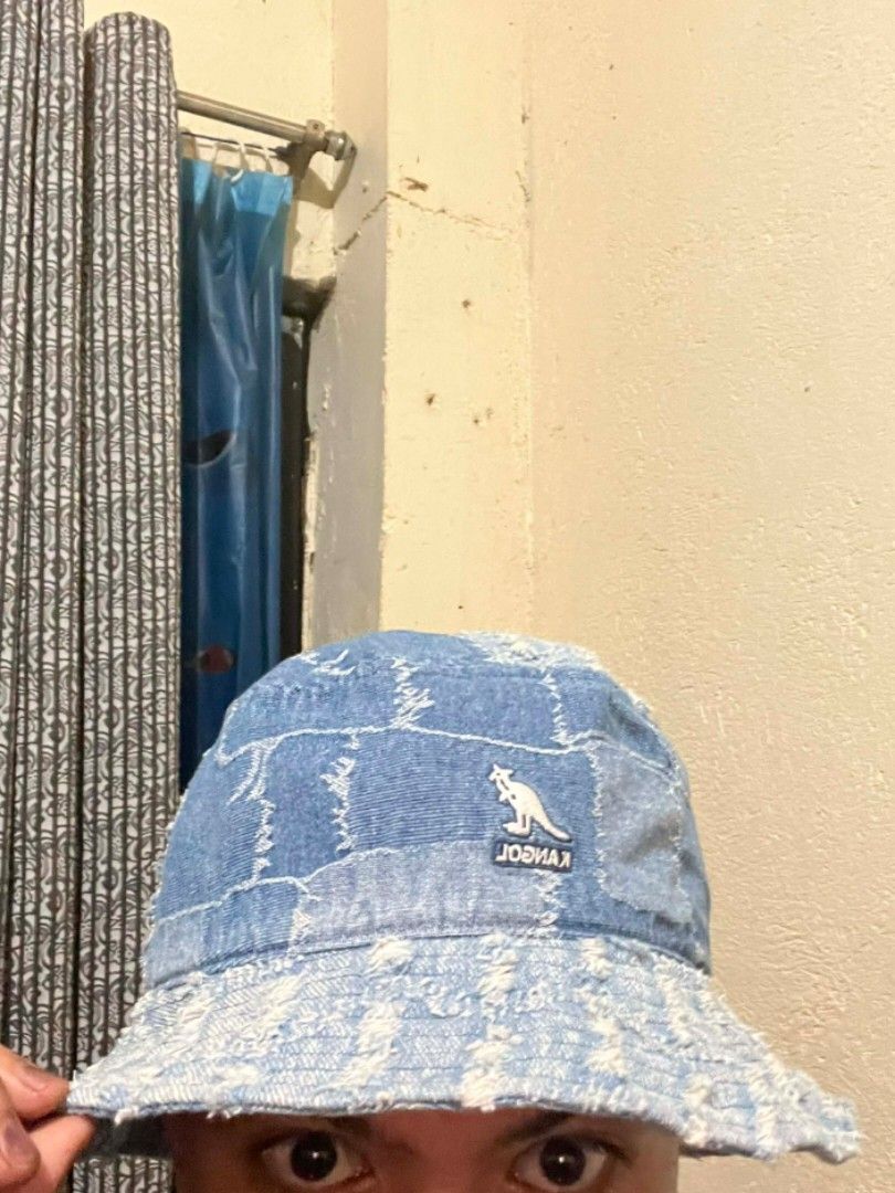Kangol Denim Bucket Hat (Category: Caps & Hats) located in Manila. Submitted by dre.yuithero (Listing ID 1429266279, Image 3). Description: Kangol bucket hat is made of denim. It features a patchwork design and a Kangol logo. The hat is a medium size. It has a blue color. The hat is perfect for adding a touch of style to any outfit..