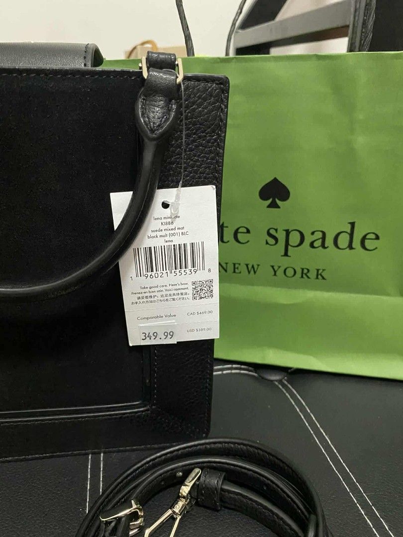 Kate Spade - Lena Suede Mini Tote (Category: Luxury Bags & Wallets) located in Marikina City. Submitted by kcgge (Listing ID 1429330636, Image 2). Description: Authentic Kate Spade handbag in black. Features a top handle and a detachable shoulder strap. Includes a Kate Spade paper bag. The original price tag is still attached, showing a price of $349.99. The bag has a structured design with a rectangular shape. Note: Price is still negotiable.