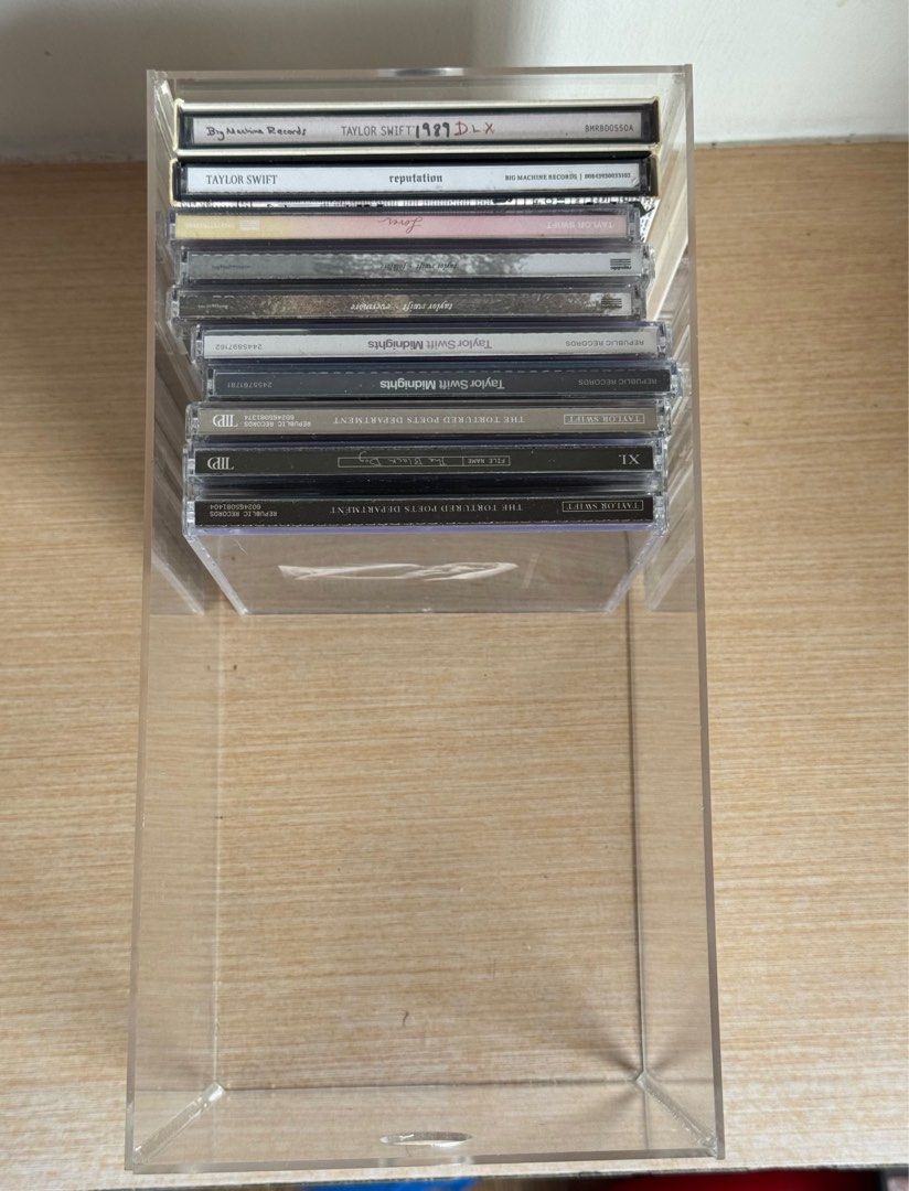 Lightly Used- CD Storage Box Transparent Acrylic Dormitory Space Saving [For Collectors] (Category: Storage Boxes & Baskets) located in Taguig. Submitted by chrisdanguy (Listing ID 1429181865, Image 2). Description: Used CD storage box. Made from transparent acrylic. CDs in pictures not included. RFS: Upgraded to shelves (also available) so I am selling these.