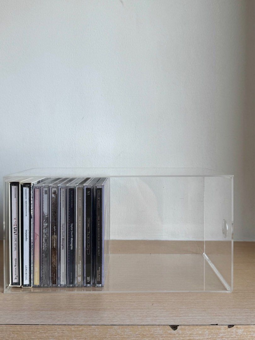 Lightly Used- CD Storage Box Transparent Acrylic Dormitory Space Saving [For Collectors] (Category: Storage Boxes & Baskets) located in Taguig. Submitted by chrisdanguy (Listing ID 1429181865, Image 1). Description: Used CD storage box. Made from transparent acrylic. CDs in pictures not included. RFS: Upgraded to shelves (also available) so I am selling these.