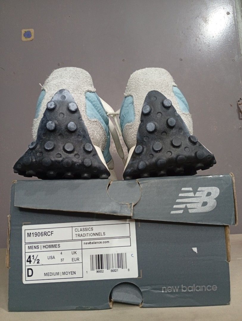 New Balance 327 Sneakers - Blue (Category: Sneakers) located in Makati City. Submitted by vians2002 (Listing ID 1429171035, Image 3). Description: New Balance 327 sneakers in a light blue and white colorway. Features a unique sole design and the iconic New Balance logo on the side. The shoes come with their original box. The size is 4.5 (US) and 4 (UK)..