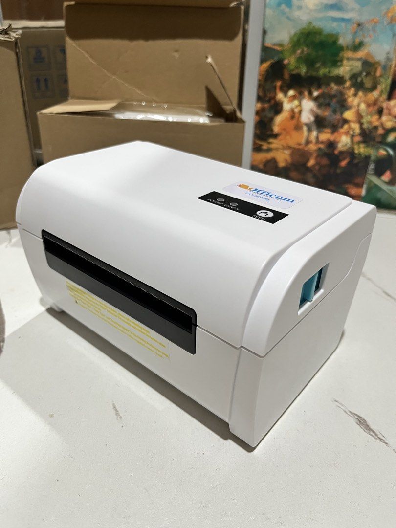 Officom Thermal Label Printer (Category: Printers, Scanners & Copiers) located in Antipolo. Submitted by pietroph.98 (Listing ID 1429181509, Image 3). Description: OFFICOM ZJ900 Waybill Printer A6 Size (USB + BLUETOOTH) - Print Comand - CPCL / TSPL command (ESC/POS command) - Print Method - Direct Line Thermal - Resolution - 203DPI (8dot/mm) - Media Sensor - Dual-media sensors: transmissive and reflective - One-dimensional code - UPC-A / UPC-E / 