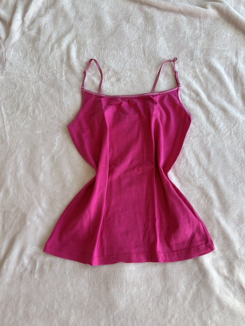 Pink Spaghetti Strap Camisole (Category: Sleeveless) located in Manila. Submitted by rayennss (Listing ID 1429270833, Image 1). Description: Camisole features a vibrant pink color and delicate spaghetti straps. It has a simple, classic design. The camisole has a flattering fit and is perfect for layering or wearing on its own. It's a versatile piece that can be dressed up or down..