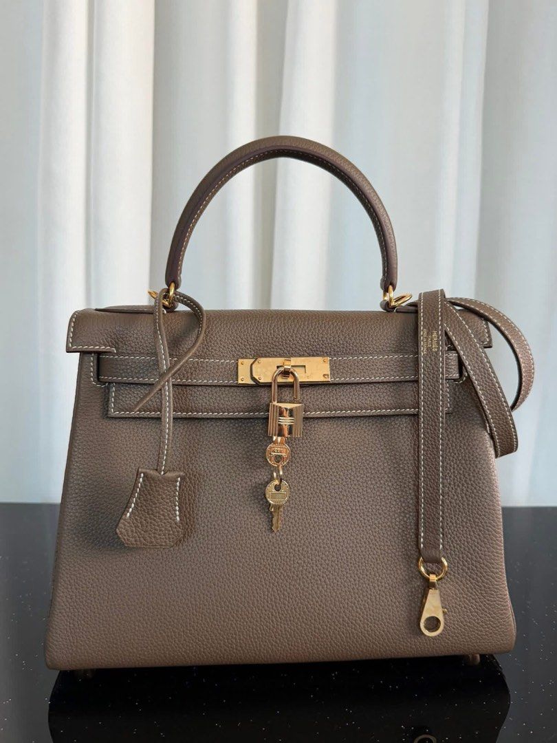 Rush Sale‼️ Kelly 28 (Category: Luxury Bags & Wallets) located in Manila. Submitted by bagsandmanymanymore1 (Listing ID 1426080285, Image 2). Description: Preloved Kelly Bag Size 28cm Before 28,000 Handmade Made in France Removable Lanyard Palladium plated Please read before you order 👉🏻❗️Payment first before shipping ❗️Cut off time of payment 11am sameday delivery ❗️NO MEET UP / NO PICK UP ❗️ORDER CANNOT BE CANCELLED ❗️PLEASE DON’T BUY IF YOU 