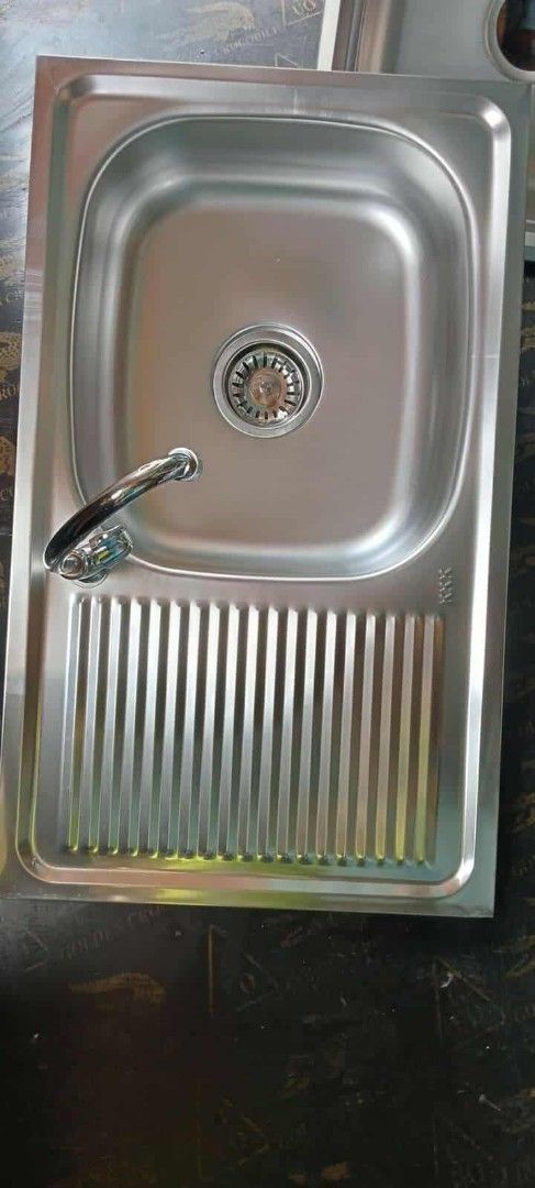 Stainless Steel Kitchen Sink with Drainboard (Category: Bathroom & Kitchen Fixtures) located in Manila. Submitted by muranglababo_ph2026 (Listing ID 1429179706, Image 3). Description: Murang stainless lababo with drainboard “Matibay at Malinis na Stainless Lababo – Murang Deal!” 📋 Description: For sale: Pre-loved stainless steel lababo. ✔ Malinis at maayos ang kondisyon ✔ Matibay at walang tagas ✔ Ready to install – swak sa kusina o laundry area