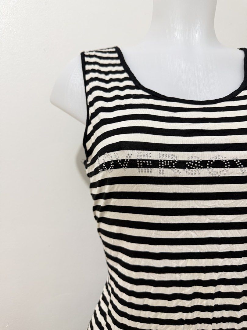 Striped Sleeveless Dress (Category: Dresses) located in Imus. Submitted by queens_collectionsph (Listing ID 1429172077, Image 2). Description: THRIFT/UKAY - ALL WASHED🫧 - Striped Sleeveless Dress - Size: M - Color: Black and White - Design: Classic striped pattern - Condition: Good - Location: Imus Cavite.