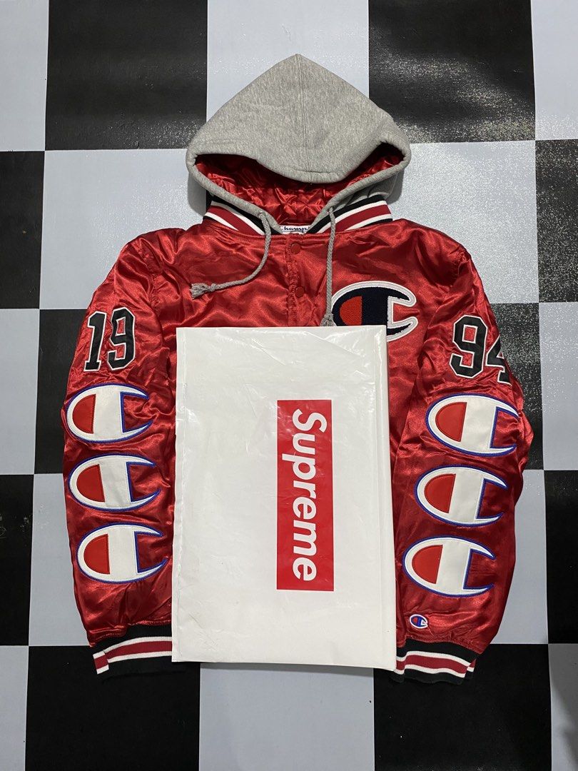 Supreme x Champion Satin Hooded Jacket (Category: Coats, Jackets and Outerwear) located in Manila. Submitted by thrift2mill (Listing ID 1429323915, Image 2). Description: brand new with zip lock plastic bag dimes:23x27.