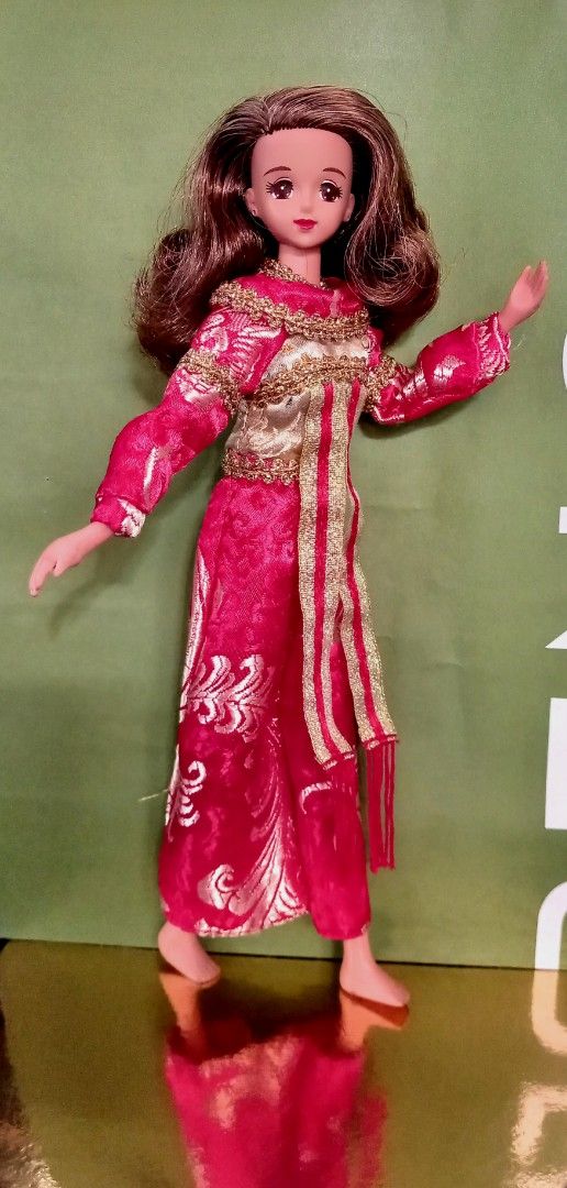 Takara Jenny Balinese Doll (Category: Plushies & Soft Toys) located in Pasig City. Submitted by toochee_dolls (Listing ID 1429169024, Image 3). Description: TAKARA JENNY BALINESE DOLL NOTE: Hindi po ito bago, 2ND HAND po ito, AS IS po Brown Skin Original Costume NO shoes Silicon Wired Body check pictures please GCASH payment JRS courier only NO rider pick up coz i go to work and i cant wait.