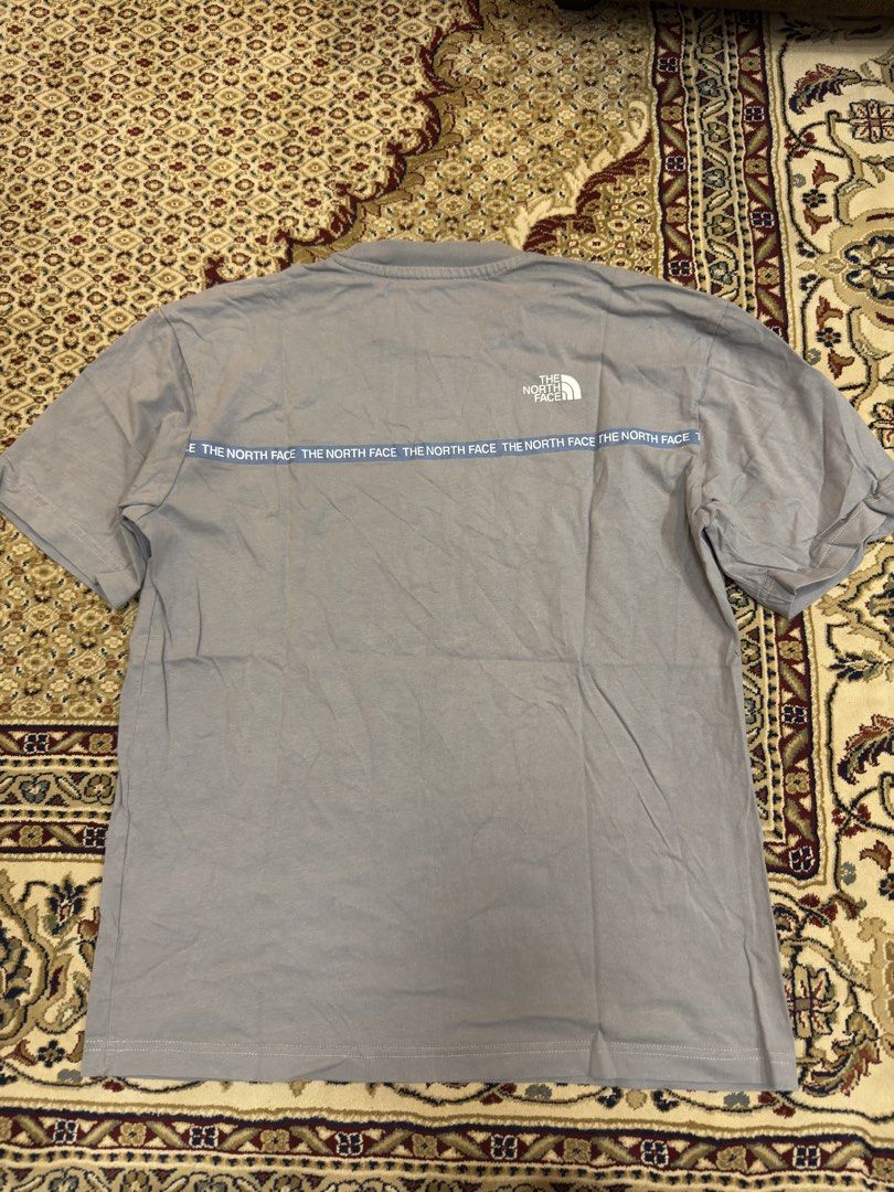 The North Face Gray T-Shirt (Category: Tshirts & Polo Shirts ) located in Manila. Submitted by zerachiel_ (Listing ID 1429289930, Image 2). Description: 20x27.