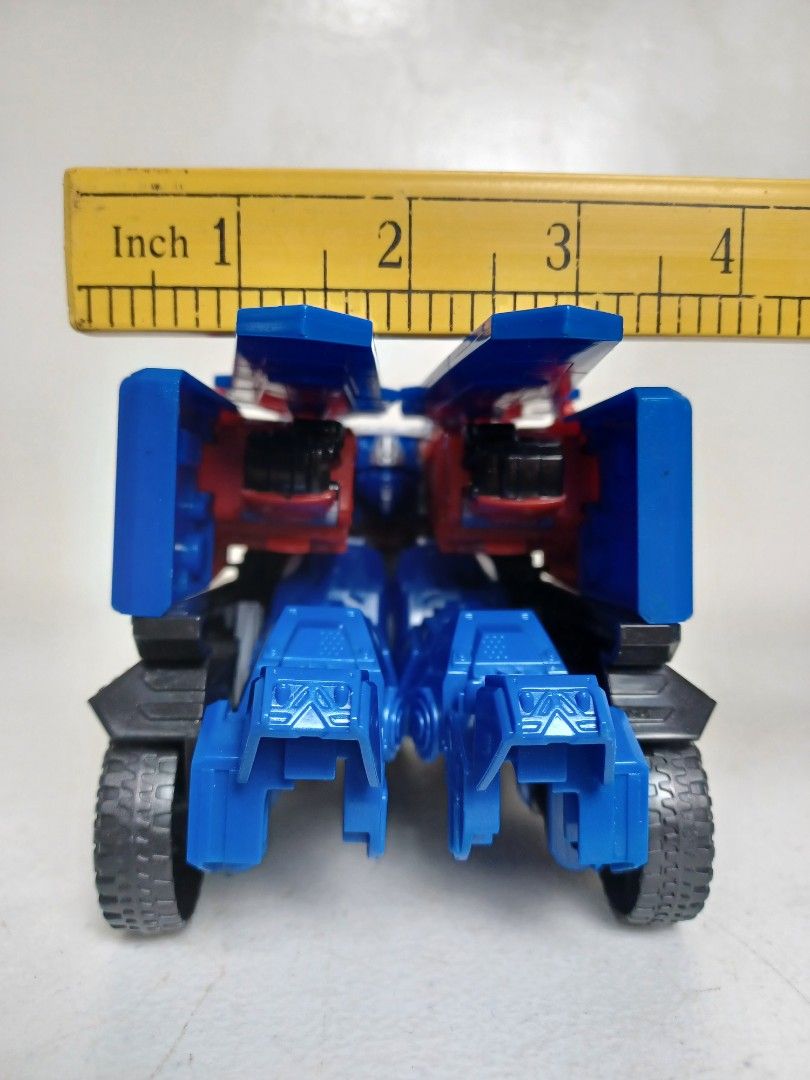 Transformers ROTB Beast-Mode Optimus Prime (Category: Action & Battle Toys) located in Baguio. Submitted by restyrille77846 (Listing ID 1429285682, Image 3). Description: Transformers ROTB Beast-Mode Optimus Prime action figure. It transforms from a truck to a robot. The figure is red and blue with black wheels. The figure is approximately 8 inches long..