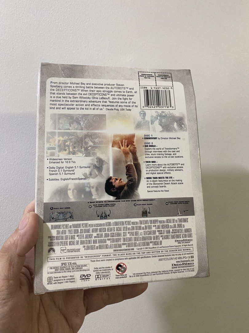 Transformers Two-Disc Special Edition DVD (Category: CDs & DVDs) located in Pasig City. Submitted by randomhobbiesandcollectibles (Listing ID 1429279601, Image 2). Description: - Transformers Two-Disc Special Edition DVD - Transforming Megatron DVD case - brand new/factory sealed - cardboard insert has dents - Widescreen format - Dolby Digital 5.1 Surround - Spanish subtitles - Includes documentaries and behind-the-scenes content - Directed by Mi