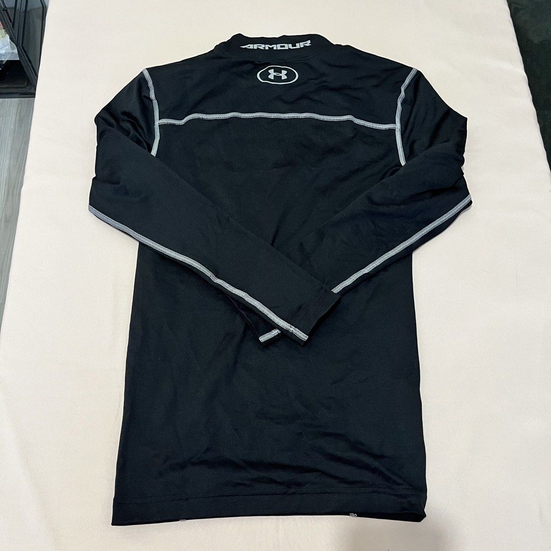 Under Armour ColdGear Compression Long Sleeve (Small) (Category: Activewear) located in Panabo. Submitted by munch.ph (Listing ID 1429227483, Image 2). Description: Original Under Armour ColdGear compression shirt in good condition. Perfect for workouts, running, or layering in cooler weather. • Size: Small (SM) • Fit: Compression • Color: Black with gray stitching • Material: 87% Polyester / 13% Elastane • Made in Bangladesh • Authentic (with ta